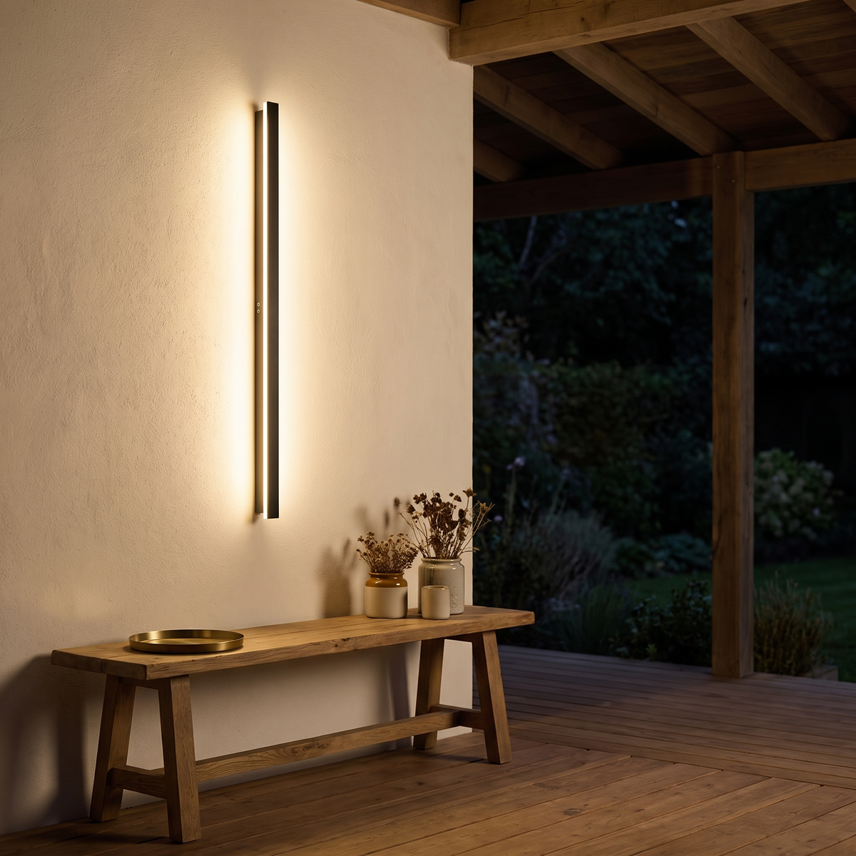 Lumera wall light above a timber bench on a covered porch at night
