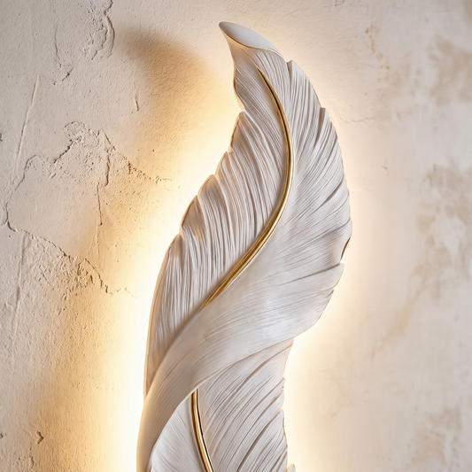 Close detail of the translucent feather form of the Plumea sconce