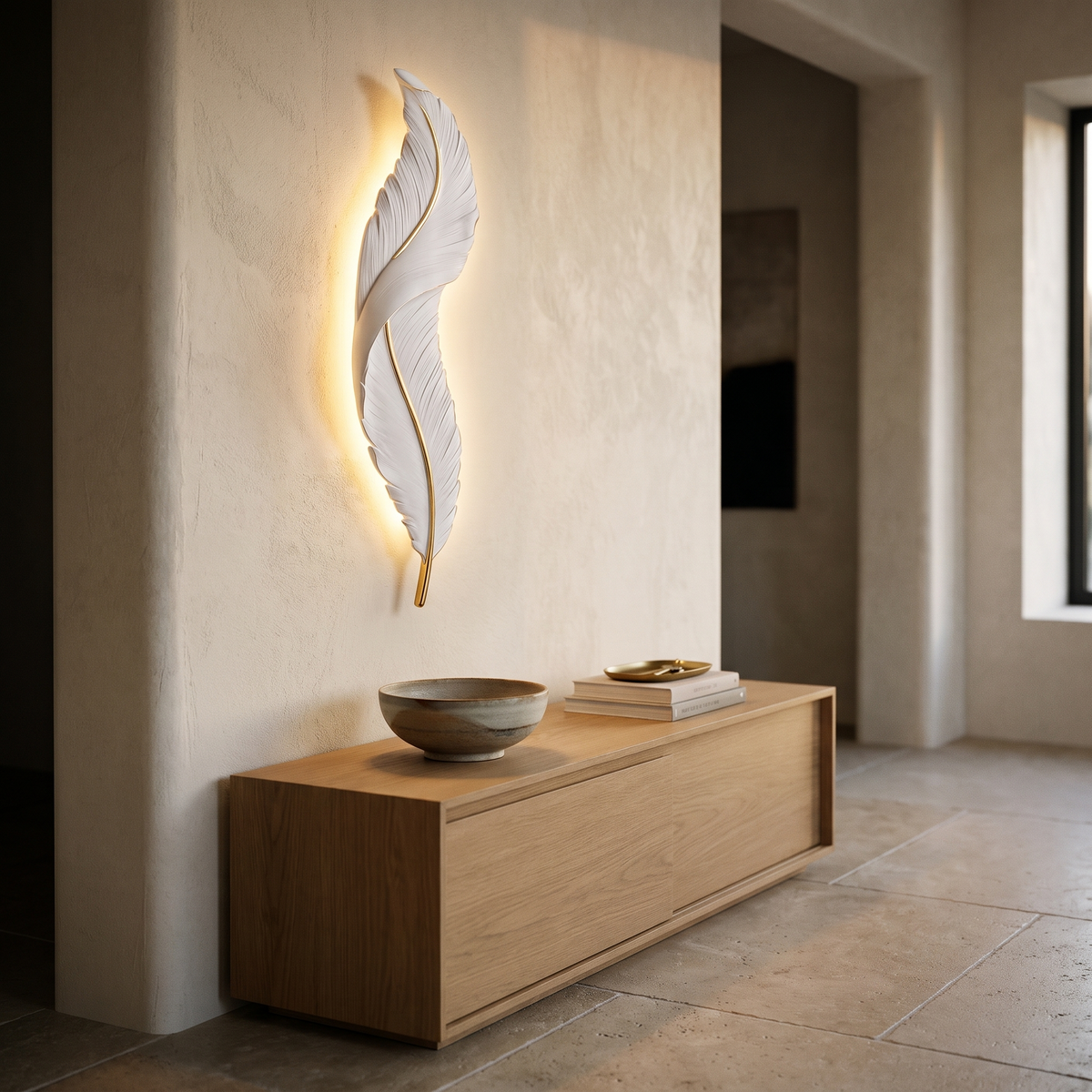 Plumea sconce above a timber console in an entry hall at dusk