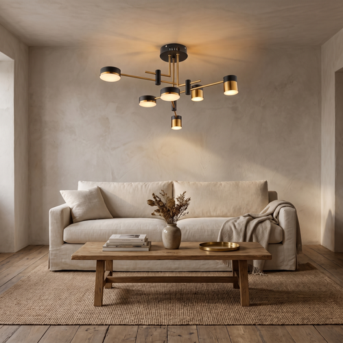 Astraeo chandelier in a living room above a linen sofa in the evening
