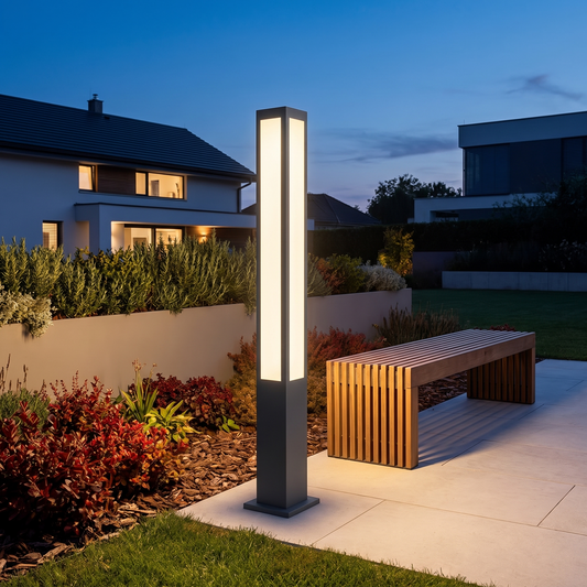 Verdano bollard light at 59 inches beside a timber garden bench