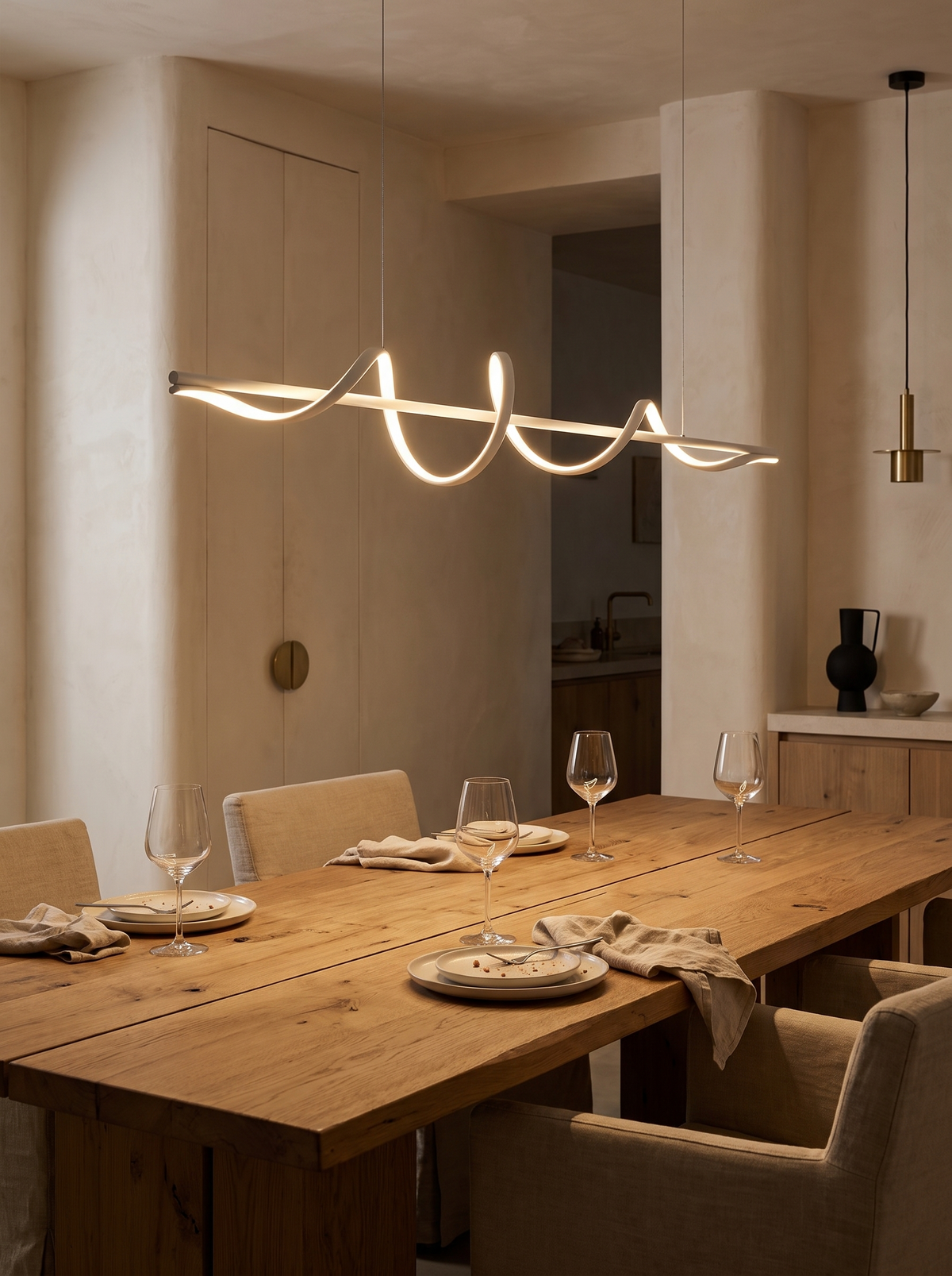 Ondelle chandelier over a dining table after a meal