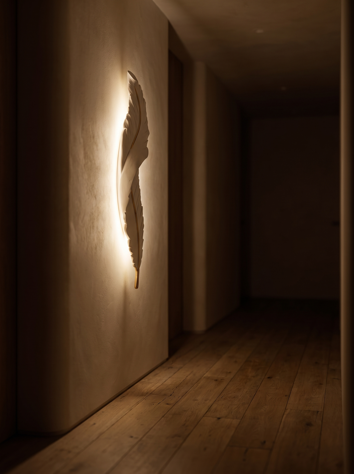 Plumea sconce lighting a hallway late at night
