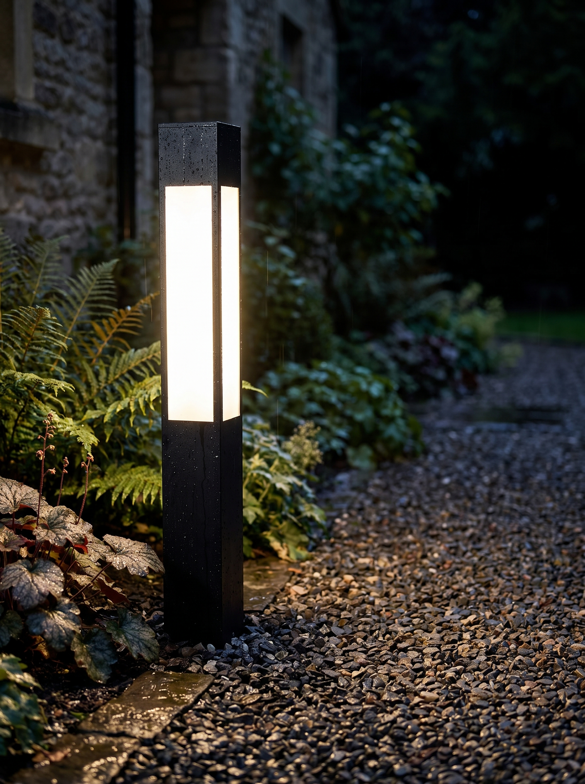 Verdano bollard after rain at night